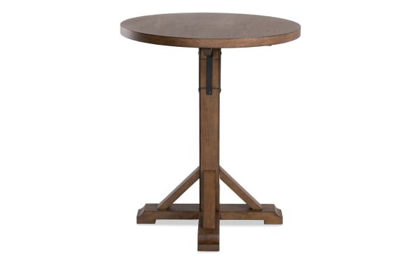 Iris Brown Adjustable Height Round Dining Table with a brown MDF, poplar, and oak veneer pedestal base, featuring a transitional style and round top.