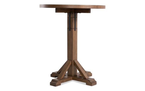 Iris Brown Adjustable Height Round Dining Table with transitional style, brown oak veneer top, and sturdy poplar solid pedestal base.