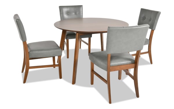 Bettie 5 Piece Walnut & Charcoal Faux Leather Upholstered Round Dining Set with mid-century modern gray faux leather chairs, walnut MDF table, and memory foam seats.