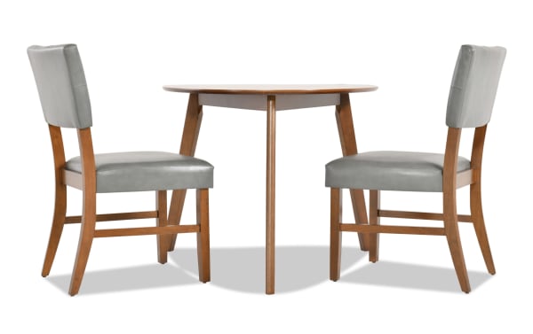 Bettie 3 Piece Walnut & Charcoal Faux Leather Upholstered Triangle Dining Set with mid-century modern flared legs, gray faux leather seats, and walnut MDF frame.