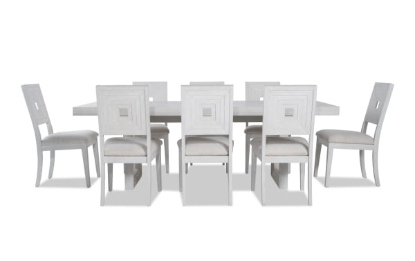 Contemporary Infinity 9 Piece White Upholstered Dining Set with extendable MDF, rubberwood, oak veneer table and polyester fabric chairs.