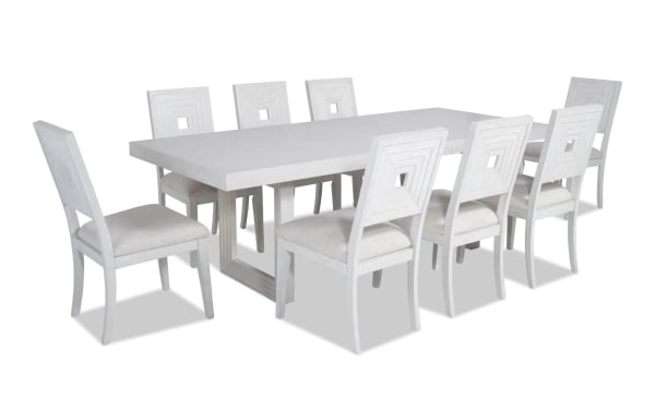 Contemporary Infinity 9 Piece White Upholstered Dining Set with extendable MDF, rubberwood, oak veneer table and polyester fabric chairs.