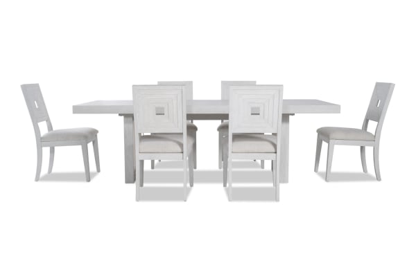Contemporary Infinity 7 Piece White Upholstered Dining Set with extendable MDF, rubberwood, oak veneer table and polyester fabric Bob-O-Pedic chairs.
