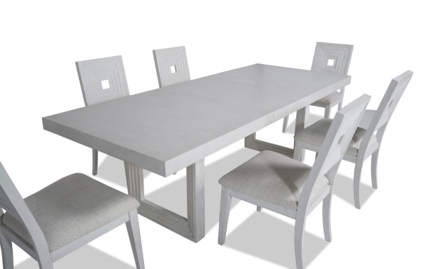 Contemporary Infinity 7 Piece White Upholstered Dining Set with extendable MDF, rubberwood, oak veneer table and polyester fabric chairs.