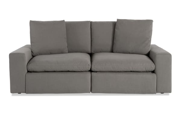 Dream Gray 88'' Power Reclining Modular Loveseat in gray polyester fabric, transitional style, with power recliners and headrests, reversible cushions.