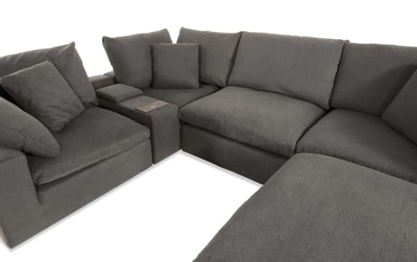 Dream Gray 131'' 6-piece modular sectional sofa in gray polyester fabric with USB/USB-C ports, 3 corners, armless chair, console, ottoman, and reversible cushions.