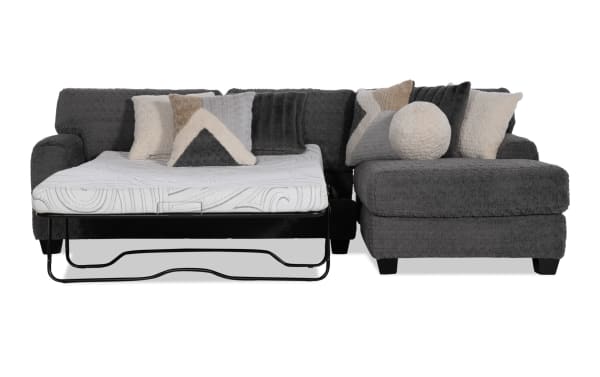 Doodle Gray 114'' 2 Piece Right Arm Facing Transitional Sleeper Chaise Sectional in gray polyester fabric with accent pillows and full cooling mattress.