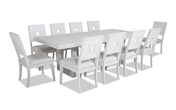 Contemporary Infinity 11 Piece White Upholstered Dining Set with extendable MDF, rubberwood, oak veneer table and polyester fabric chairs.
