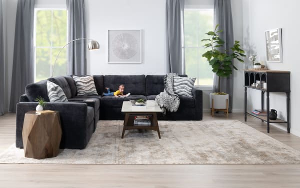 Contemporary Modular Bob® Charcoal 117'' 4-piece left arm facing fabric polyester sectional with storage, pull-out sleeper, and queen gel mattress.