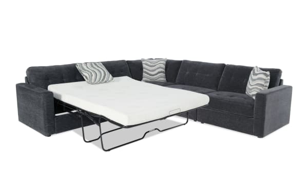 Modular Bob® Charcoal 117" 4-piece left arm facing storage sleeper sectional in contemporary gray polyester fabric with queen gel memory foam mattress and storage seats.