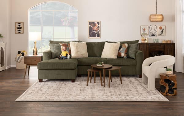 Brynn Green 114'' 2 Piece Right Arm Facing Chaise Sectional with Ottoman in soft green polyester fabric, transitional style with plush Bob-O-Pedic Memory Foam cushions and patterned accent pillows.
