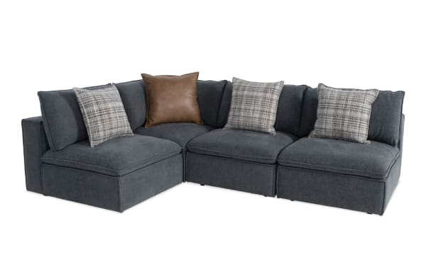 Infinity Thunder Blue 147'' 4-piece modular sectional in transitional style, blue polyester fabric with Bob-O-Pedic® seats, feather-blend pillows, and removable cushions.