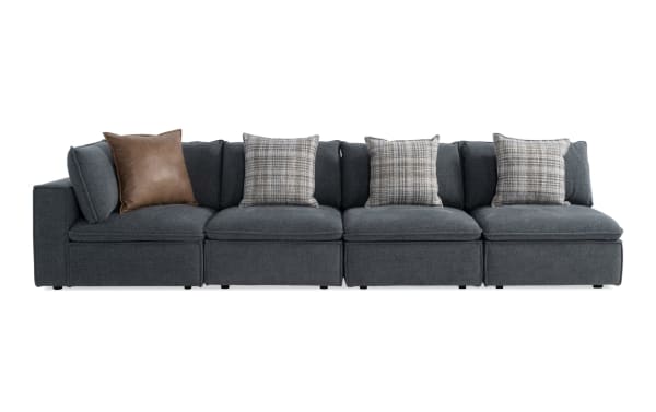 Infinity Thunder Blue 147" 4-piece modular sectional with 3 armless chairs and 1 corner, transitional style, blue polyester fabric upholstery, Bob-O-Pedic® seats, feather blend pillows.