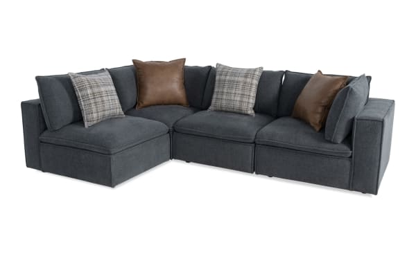 Transitional Infinity Thunder Blue 154" 4-piece modular sectional with 2 armless chairs, 2 corners, blue polyester fabric, Bob-O-Pedic® seats, feather blend pillows, and Siberian pine frame.