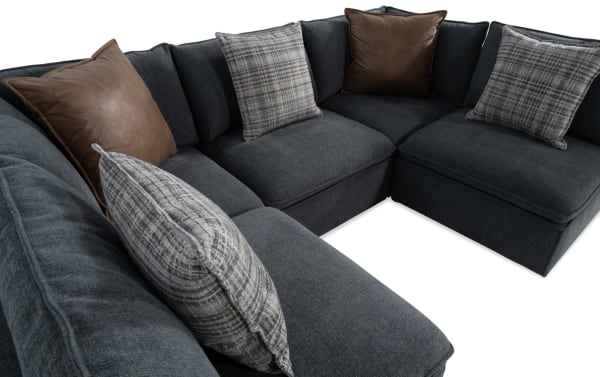 Infinity Thunder Blue 117'' 5-piece modular sectional in transitional style, blue polyester fabric with feather-blend accent pillows and removable cushions.