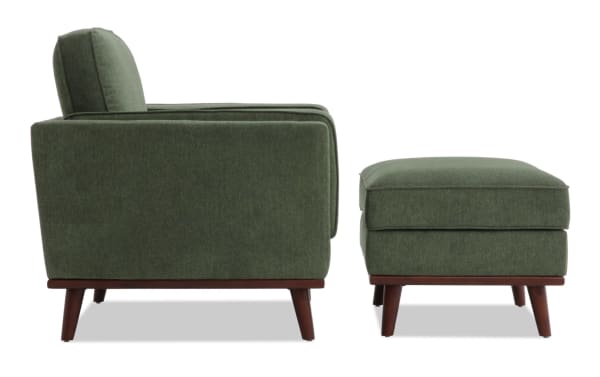 Tribeca Green Chair & Storage Ottoman set in mid-century modern style, featuring green polyester fabric, tapered wooden legs, memory foam cushions, and hidden storage ottoman.