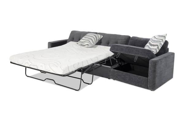 Modular Bob® 124'' 2-piece left arm facing charcoal gray storage sleeper sofa with queen cooling gel memory foam mattress, polyester fabric upholstery, and contemporary design.
