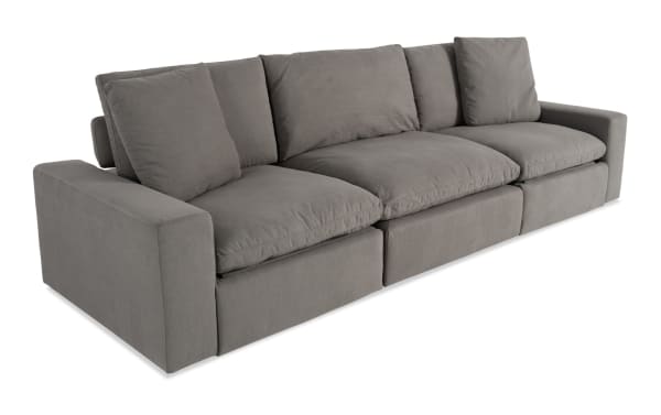 Dream Gray 131'' Power Reclining Modular Sofa with gray polyester fabric, transitional style, 2 recliners, 1 armless chair, and power headrests.