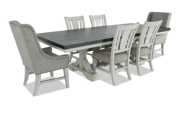 Beaumont 7 Piece Transitional Dining Set with beige polyester-upholstered memory foam chairs, extendable pine wood table with felt-lined storage drawers.