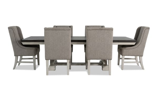 Beaumont 7 Piece Beige Upholstered Extendable Dining Set with pine solids, polyester fabric chairs, nailhead trim, and felt-lined storage drawers.