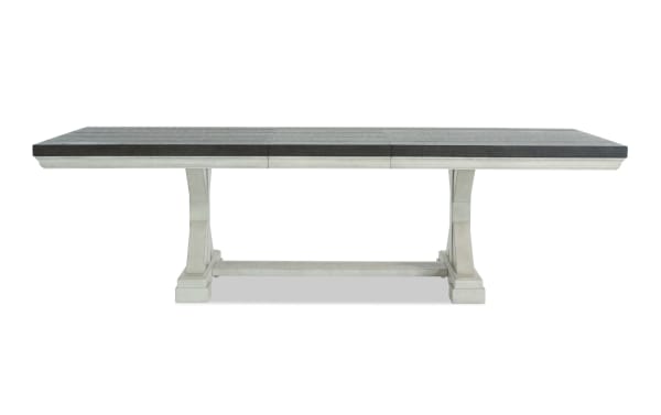 Beaumont White & Brown Extendable Storage Dining Table from Beaumont Dining collection, transitional style with pine solids, veneer, MDF, featuring a white base and dark brown top, extends from 84" to 106" with felt-lined storage drawers at each end.