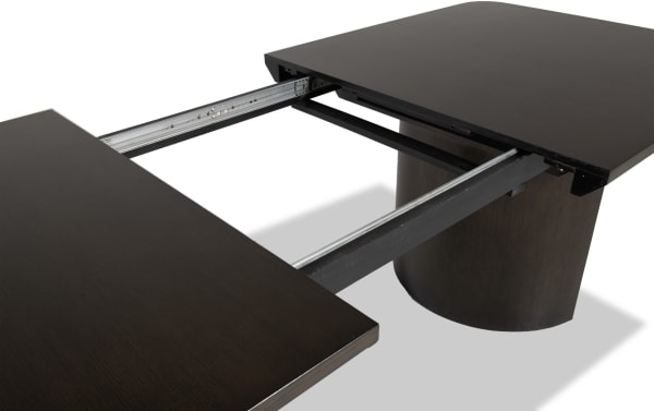 Luxe Brown Extendable Dining Table from Luxe Dining collection, contemporary style with dark oak veneer top, rubberwood solids, MDF frame, and metal extension rails.