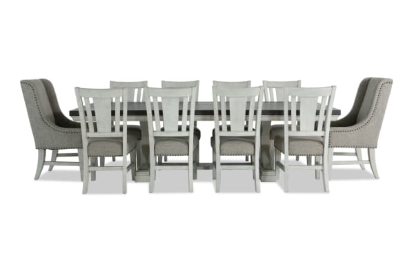 Beaumont 11 Piece Transitional Dining Set with beige polyester-upholstered Bob-O-Pedic memory foam chairs, extendable pine wood table, and felt-lined storage drawers.