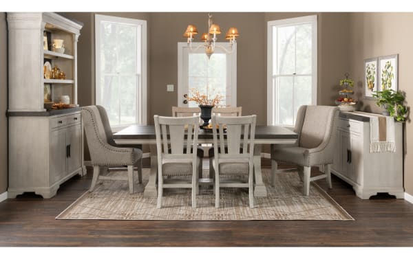 Beaumont 11 Piece Beige Upholstered Extendable Storage Dining Set with pine solids, polyester fabric, nailhead trim, memory foam chairs, and felt-lined drawers.