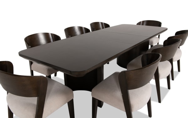 Luxe 9 Piece Brown & White Upholstered Dining Set with extendable oak veneer table, rounded edges, and Bob-O-Pedic memory foam seating in contemporary style.