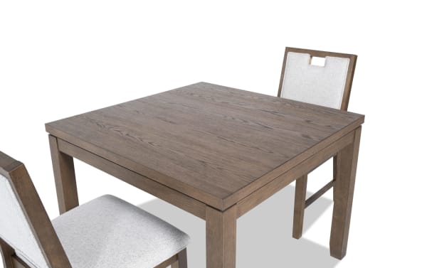 Brookline 3 Piece Brown & White Upholstered Square Dining Set with solid acacia wood, white polyester fabric, and transitional style chairs.