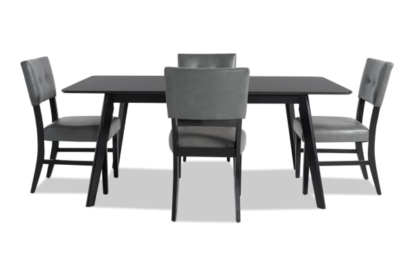 Bettie 5 Piece Black & Charcoal Faux Leather Upholstered Dining Set with mid-century modern flared legs, charcoal faux leather seats, MDF and walnut veneer table.