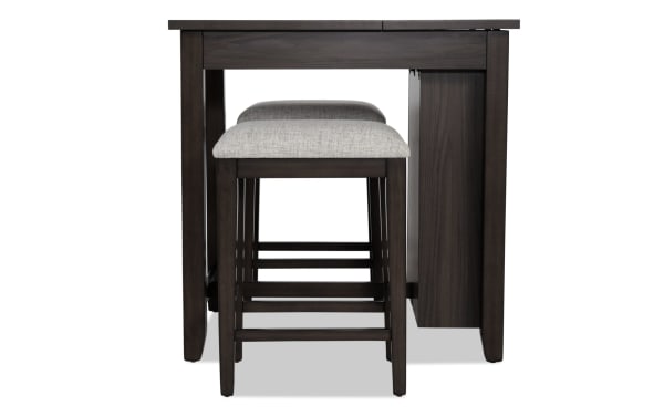 Homeworks 3 Piece Dark Brown & Gray Upholstered Counter Height Kitchen Island Set with cushioned gray polyester stools, melamine and rubberwood frame, transitional style.