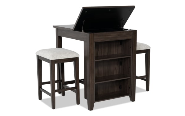 Homeworks 3 Piece Dark Brown & Gray Upholstered Counter Height Kitchen Island Set with lift-top storage, adjustable shelves, and cushioned stools.