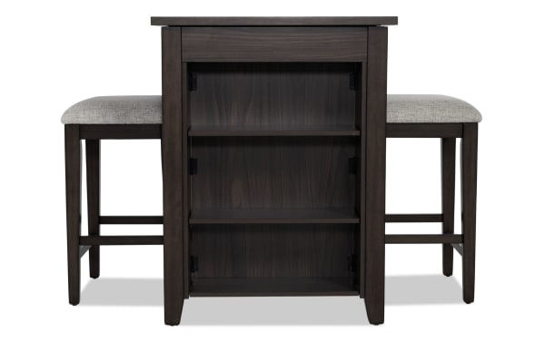 Homeworks 3 Piece Dark Brown & Gray Upholstered Counter Height Kitchen Island Set with lift-top storage, adjustable shelves, and cushioned stools in transitional style.