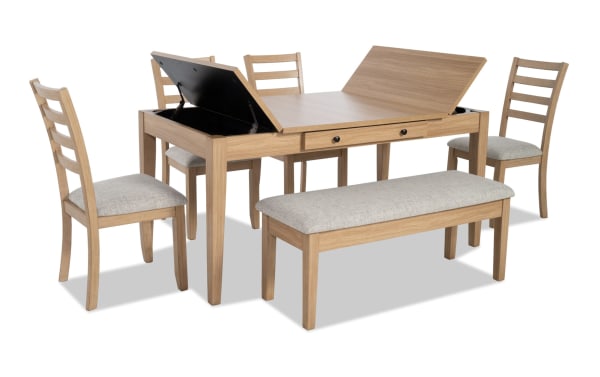 Homeworks 6 Piece Natural & Gray Dining Set with Storage Bench features a transitional gray melamine table with lift-top storage, felt-lined drawers, four ladder back chairs, and a fabric-upholstered bench with memory foam seating.