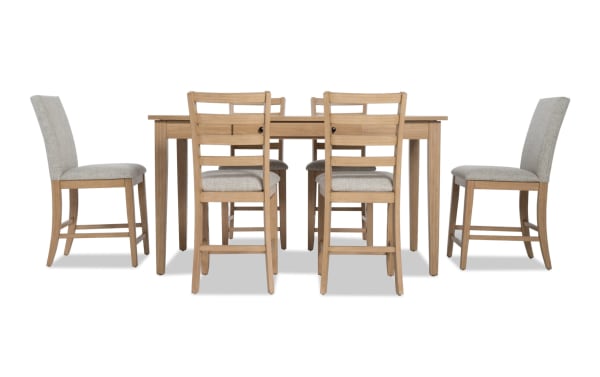 Homeworks 7 Piece Natural & Gray Upholstered Counter Height Dining Set with lift-top storage table, six gray fabric stools, and durable rubberwood frame.