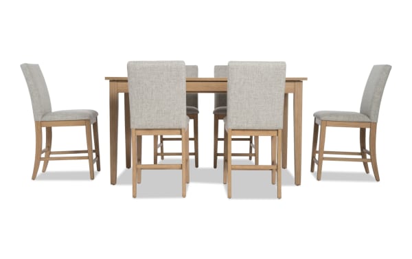 Homeworks 7 Piece Natural & Gray Upholstered Counter Height Dining Set with lift-top storage table, six gray fabric stools, and durable rubberwood frame.