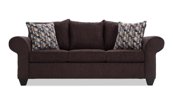 Kylie Chocolate 92'' transitional sofa in brown polyester fabric with rolled arms, three seat cushions, and two patterned accent pillows.