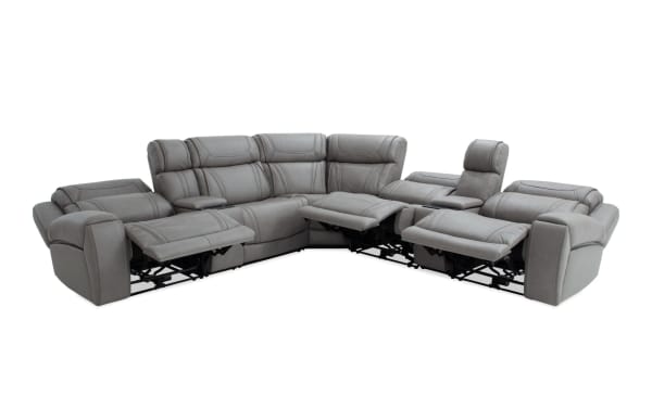 Dynamic Gray Leather 131'' Bluetooth Audio Power Reclining 7-Piece Sectional in gray leather with power recliners, adjustable headrests, storage console, and USB charging ports.