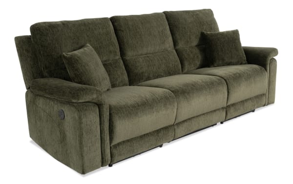 Renegade Green 103'' power reclining sofa in green polyester fabric with plush pillows, padded pillow-top arms, USB charging port, and transitional style.