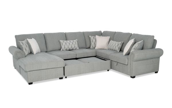 Playlist Max Spa Blue 126'' 4-piece left-arm facing traditional sectional with light blue polyester fabric, pop-up sleeper chaise, storage loveseat, accent pillows, and built-in USB/USB-C ports.