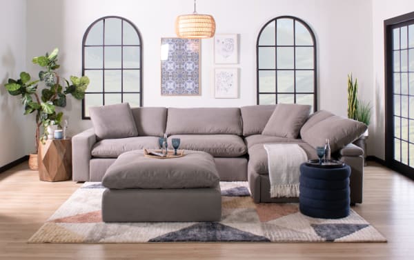 Dream Gray 144'' 8 Piece Modular Sectional in gray polyester fabric with USB/USB-C ports, reversible cushions, and transitional style.