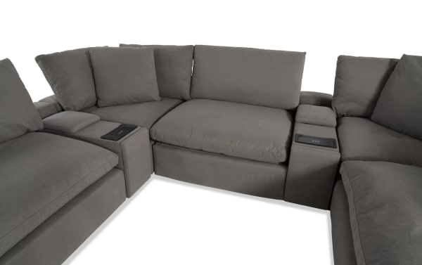 Dream Gray 144" 8 Piece Modular Sectional in gray polyester fabric with USB/USB-C ports, includes 3 armless chairs, 2 consoles, corner, and ottoman.