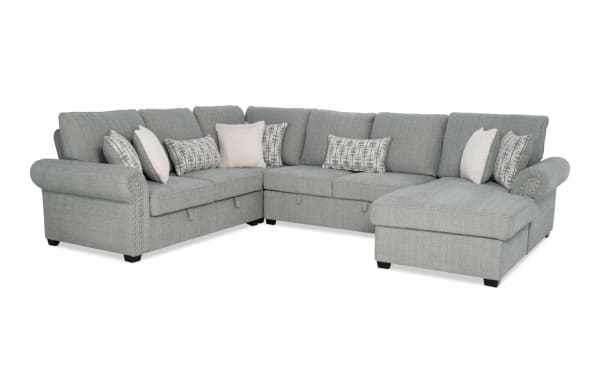 Playlist Max Spa Blue 126" 4-piece right-arm chaise sectional in light blue polyester fabric, traditional style with accent pillows and built-in USB/USB-C ports.