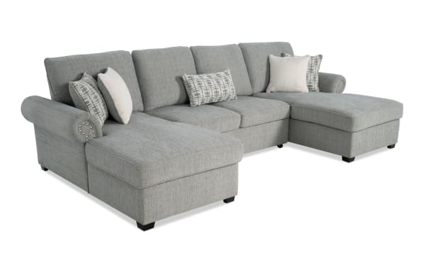 Light blue Playlist Max Spa 125" 3-piece traditional fabric polyester sectional with dual chaise, accent pillows, pop-up sleeper, and USB/USB-C ports.