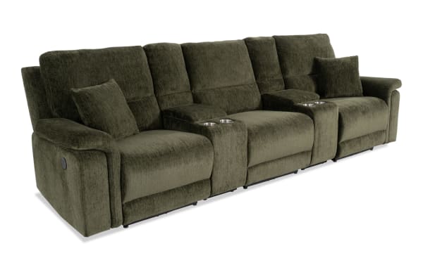 Renegade Green 130'' power reclining sofa in green polyester fabric with plush pillows, padded arms, dual consoles with cupholders, USB ports, and hidden storage.