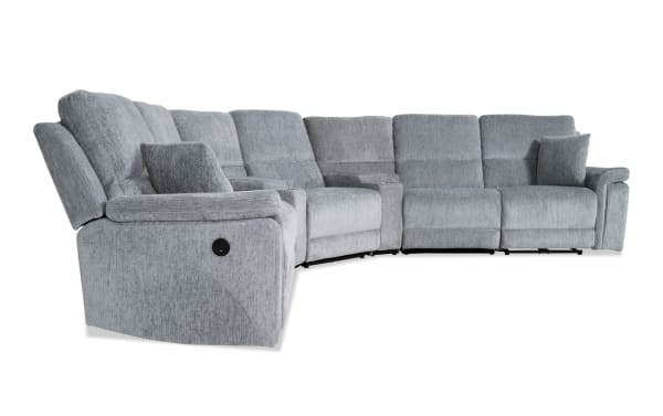 Renegade Gray 127'' power reclining 7-piece sectional in gray polyester fabric with plush pillows, padded arms, USB ports, cupholders, and hidden storage.