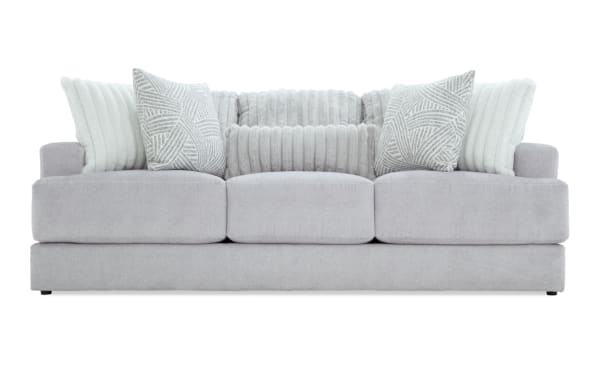 Contemporary Sofia Gray 93'' Sofa in soft gray polyester fabric with channel tufted back cushions and matching accent pillows for plush comfort.