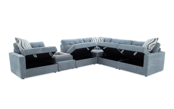 Modular Bob® Spa Blue 117'' 6-piece contemporary sectional in light blue polyester fabric with memory foam cushions, pet bed console, USB charging, and hidden storage compartments.