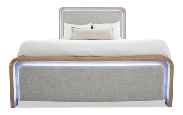 Cascade Twin Brown & Beige Upholstered Panel Bed with plush polyester fabric, engineered wood grain frame, smooth corners, and LED lighting, transitional style.